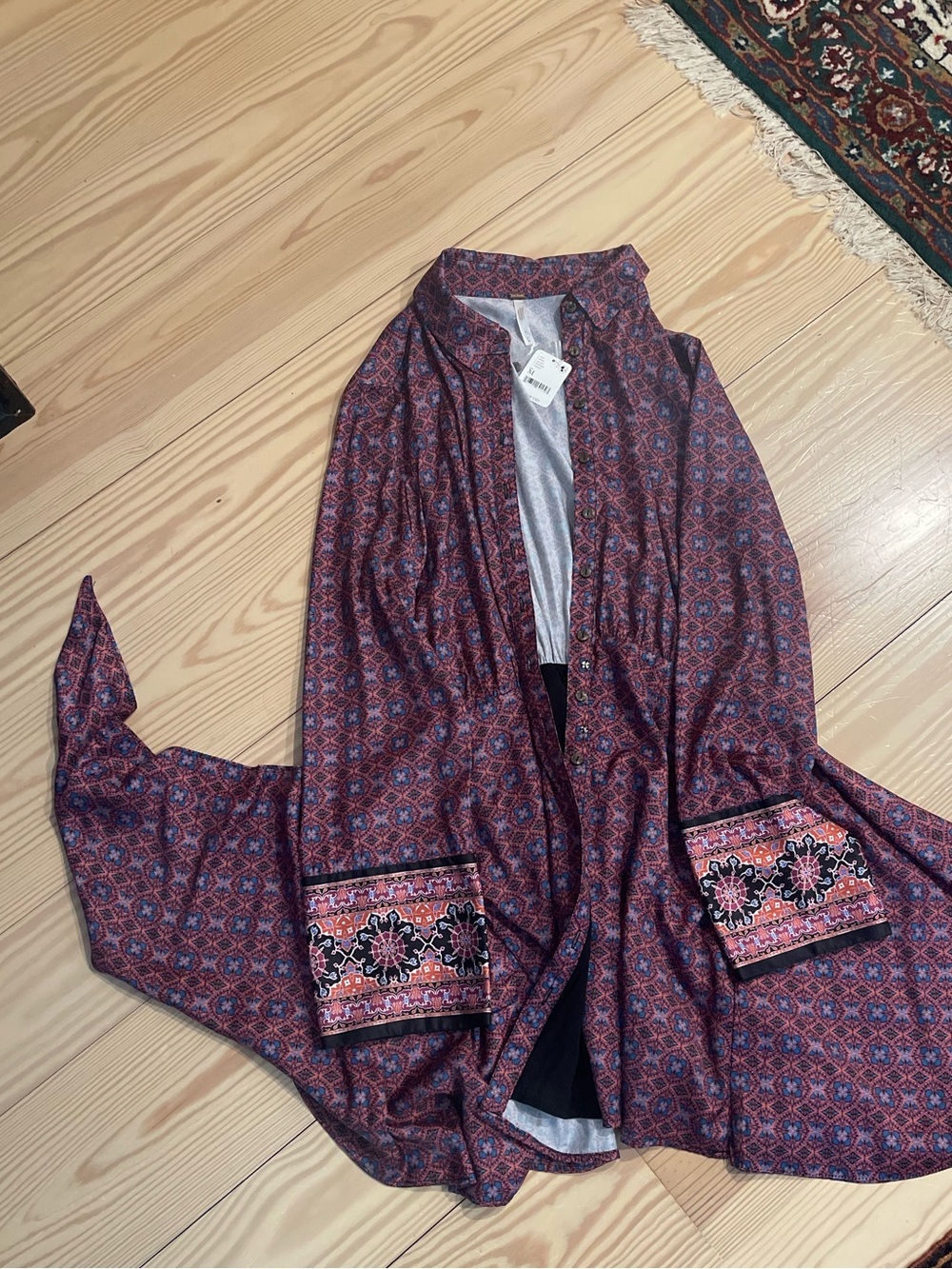 Free People button down front dress with long sleeves .